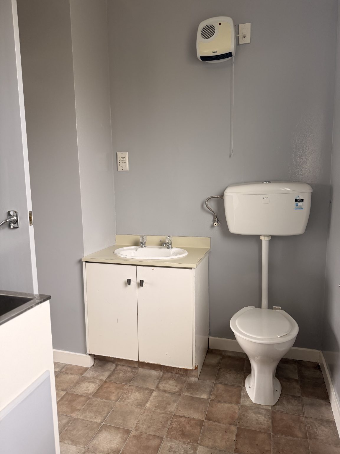 Southland unit bathroom vanity and toilet